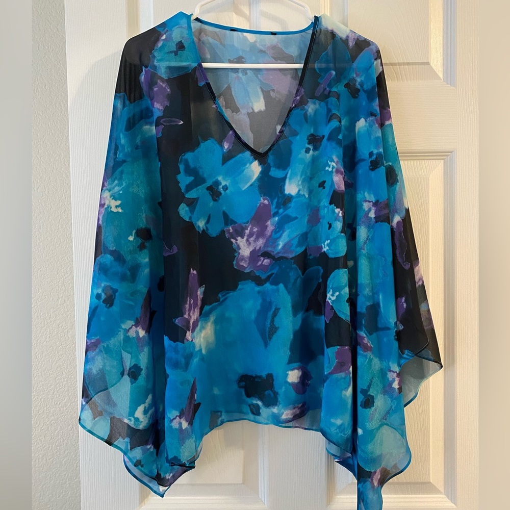 Sheer women’s blouse or swim cover up